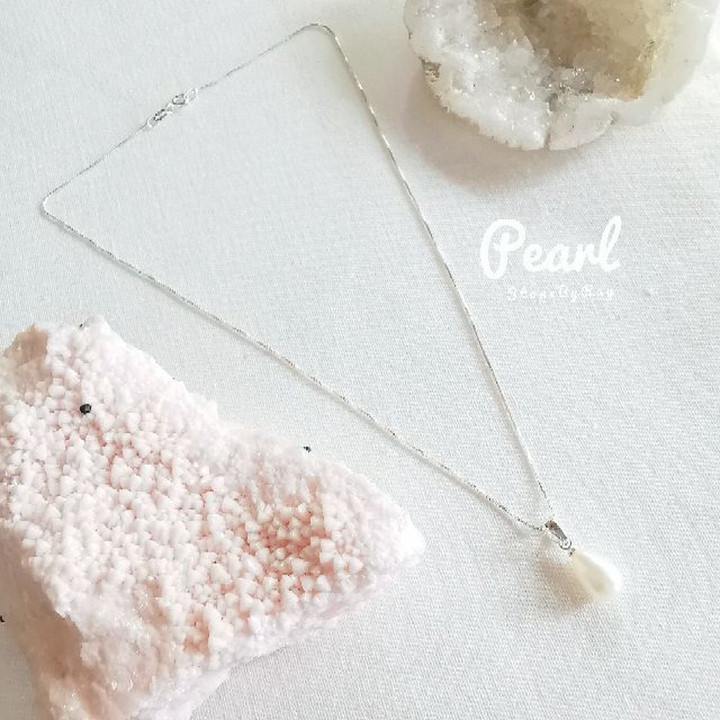 Elegant Silver Necklace with White Pearl Pendant