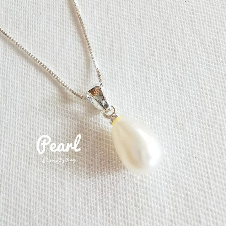 Elegant Silver Necklace with White Pearl Pendant