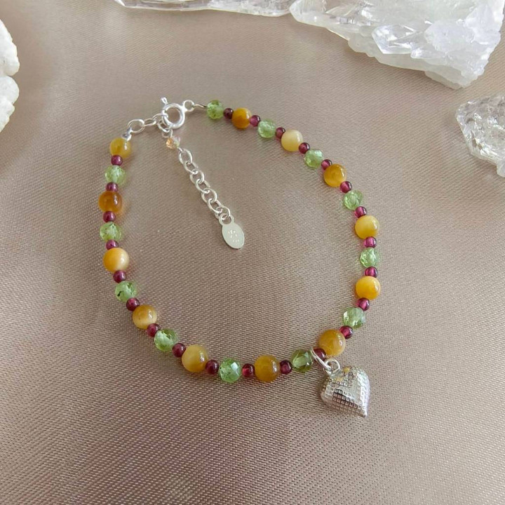 Kraftschutzarmband aus Tigerauge, Granat und Peridot