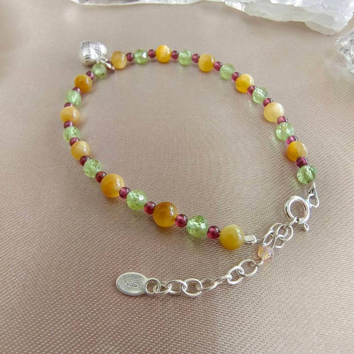 Kraftschutzarmband aus Tigerauge, Granat und Peridot