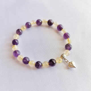 Amethyst and Rutilated Quartz Bracelet: Protection and Energy