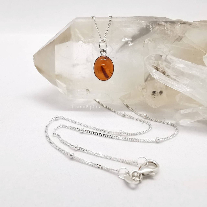 Elegant Silver Necklace with Amber Pendant
