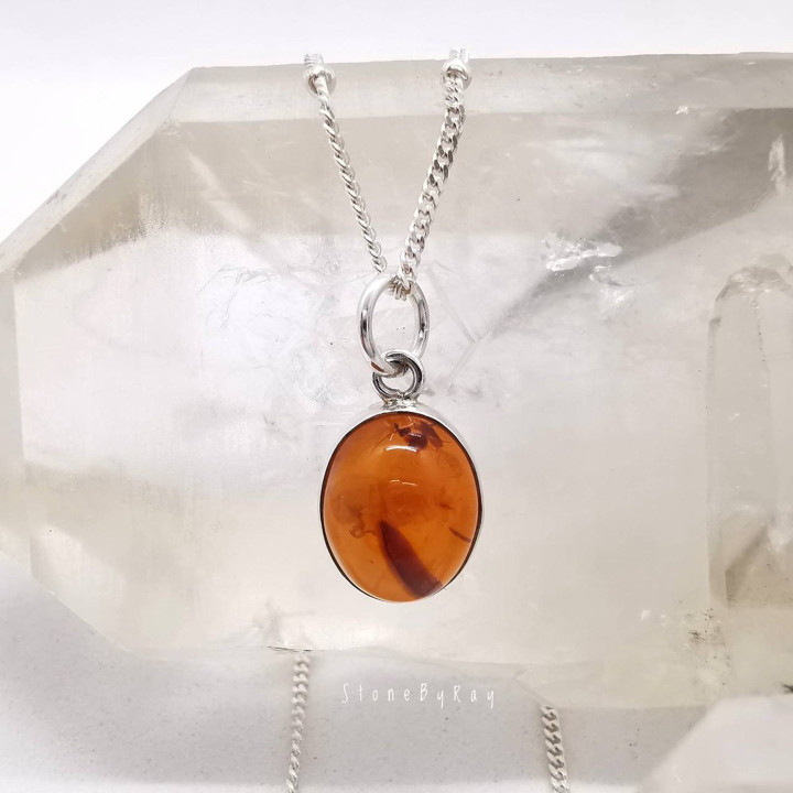 Elegant Silver Necklace with Amber Pendant