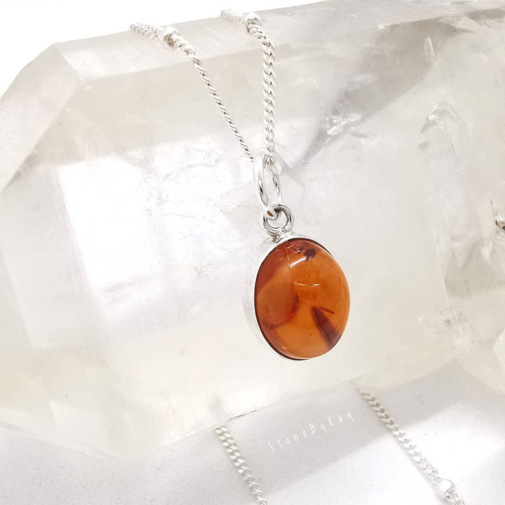 Elegant Silver Necklace with Amber Pendant