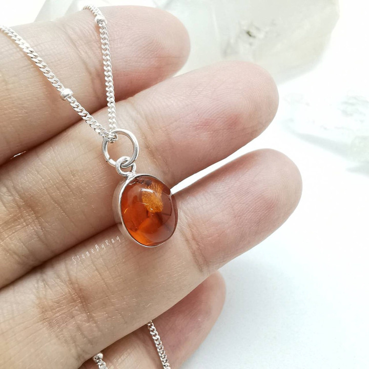 Elegant Silver Necklace with Amber Pendant