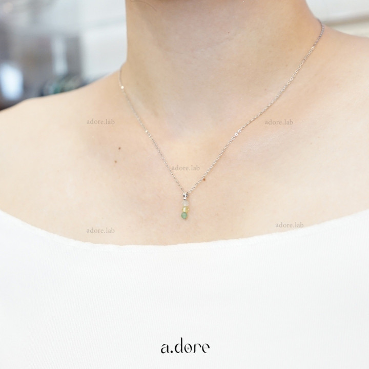 Collar de tres piedras de la suerte: peridoto, fluorita y aventurina.