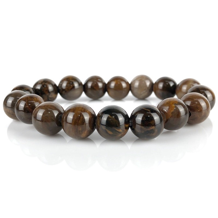 Pulsera de madera petrificada de un millón de años de antigüedad: auténtica y de buen augurio.