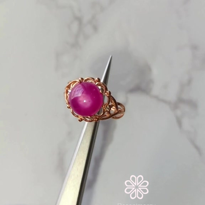 Bague en argent sterling et or rose ornée d'un rubis éclatant de 5 carats