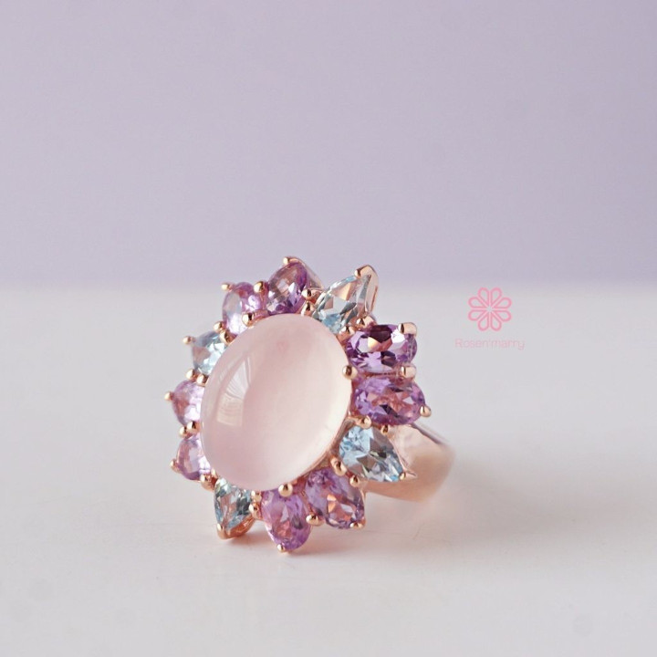Strahlender Rosenquarzring mit Amethyst und Topas in Sterlingsilber