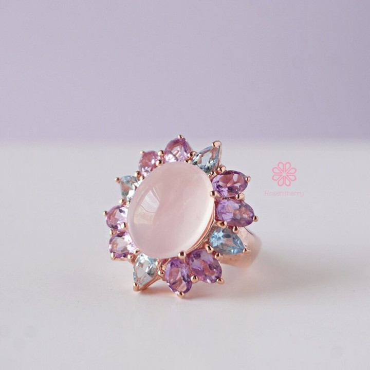 Strahlender Rosenquarzring mit Amethyst und Topas in Sterlingsilber