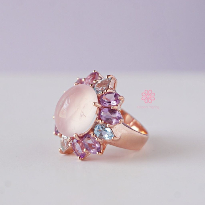 Strahlender Rosenquarzring mit Amethyst und Topas in Sterlingsilber