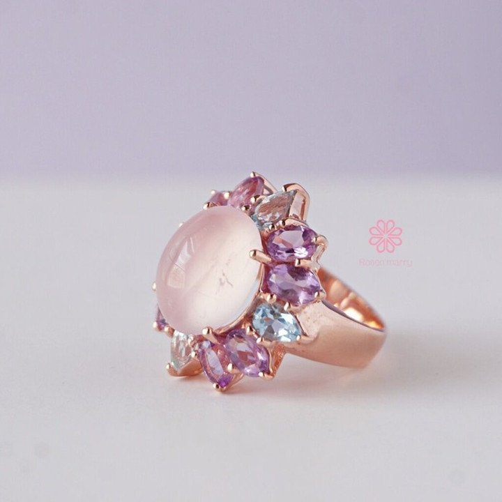 Strahlender Rosenquarzring mit Amethyst und Topas in Sterlingsilber
