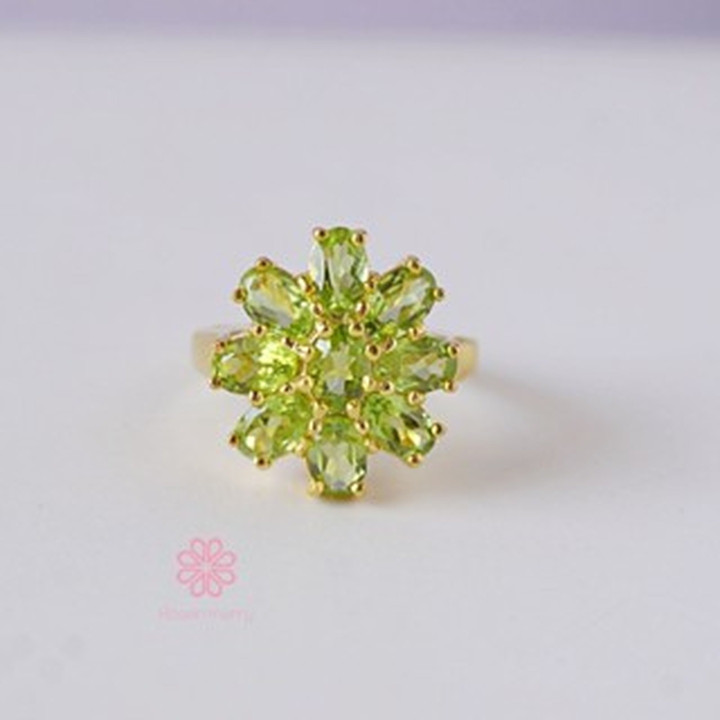 Strahlender Peridot-Ring aus Sterlingsilber und Gold