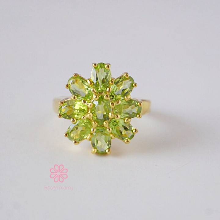 Strahlender Peridot-Ring aus Sterlingsilber und Gold