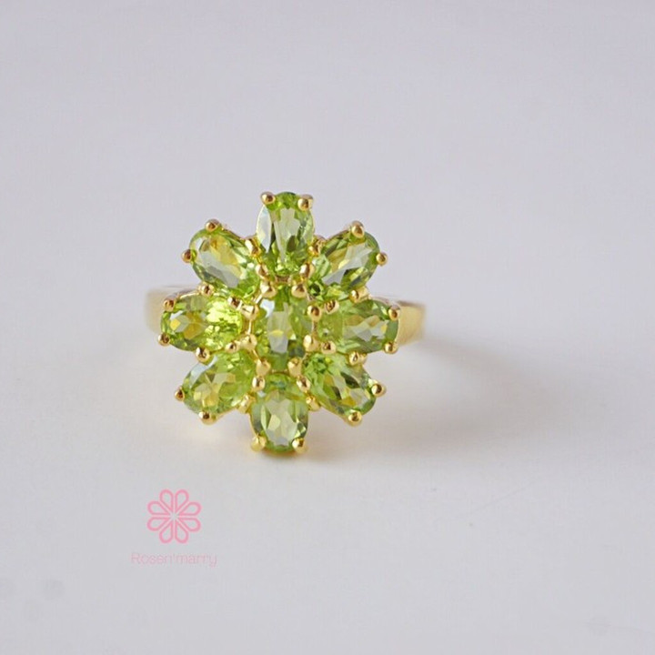 Strahlender Peridot-Ring aus Sterlingsilber und Gold