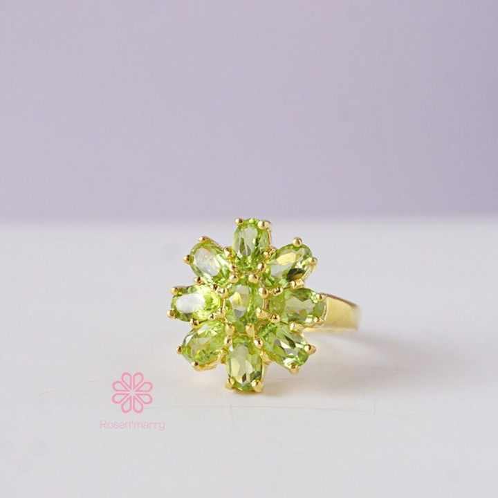 Strahlender Peridot-Ring aus Sterlingsilber und Gold