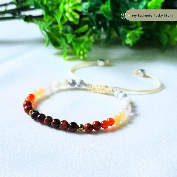 Pulsera de piedras rojas y blancas: Coraje, éxito, equilibrio y suerte.