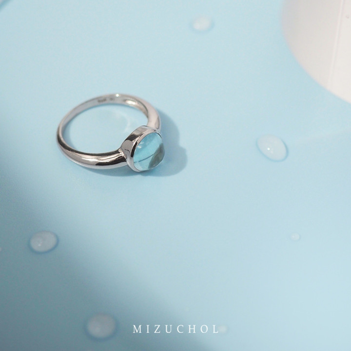 White Gold Plated Sterling Silver Blue Topaz Ring