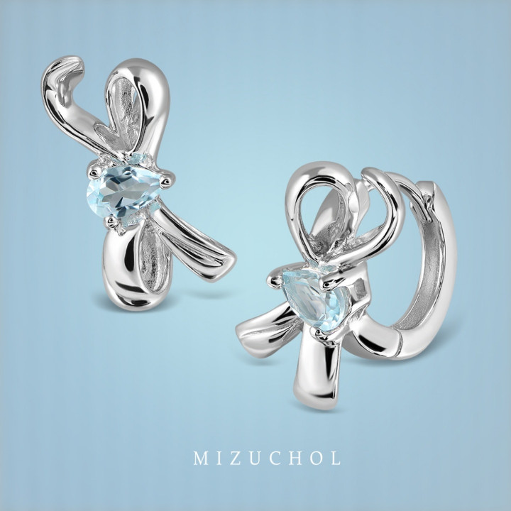 Ohrringe aus weißvergoldetem Sterlingsilber mit blauem Topas