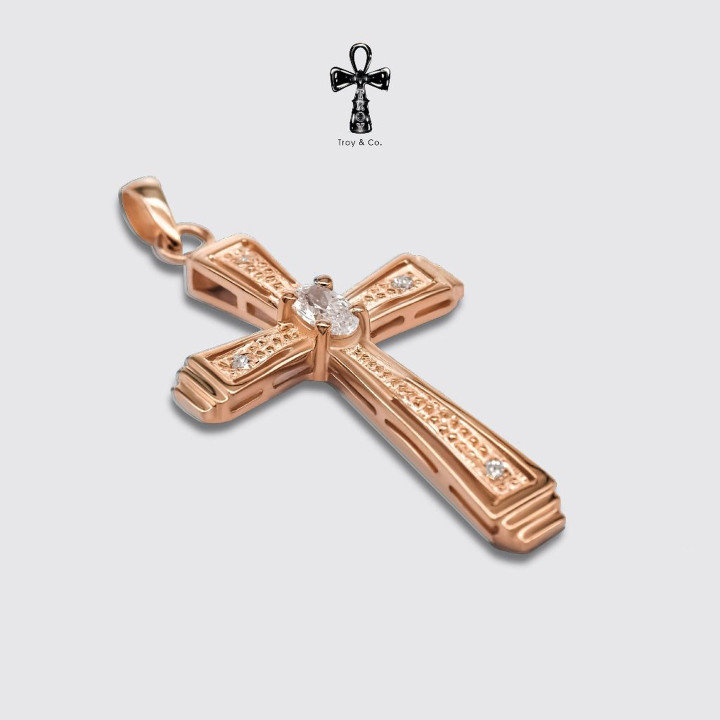 Colgante de cruz de plata de ley con brillantes piedras de circonita cúbica.