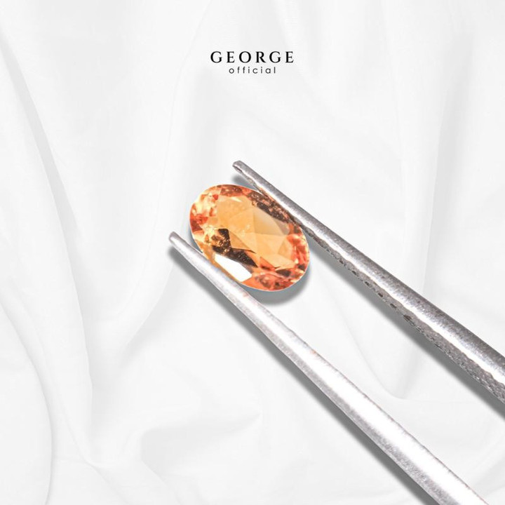 Anillo ovalado de zafiro naranja de George Jewelry