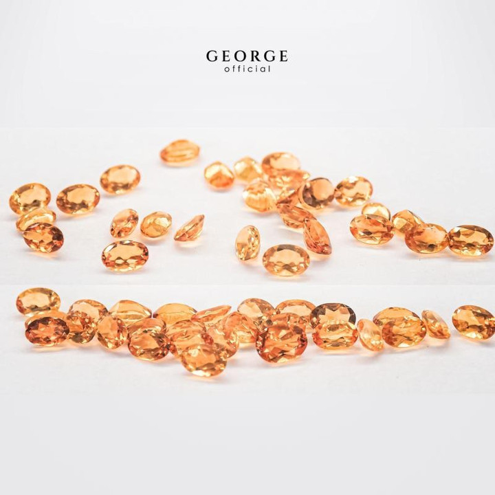Anillo ovalado de zafiro naranja de George Jewelry