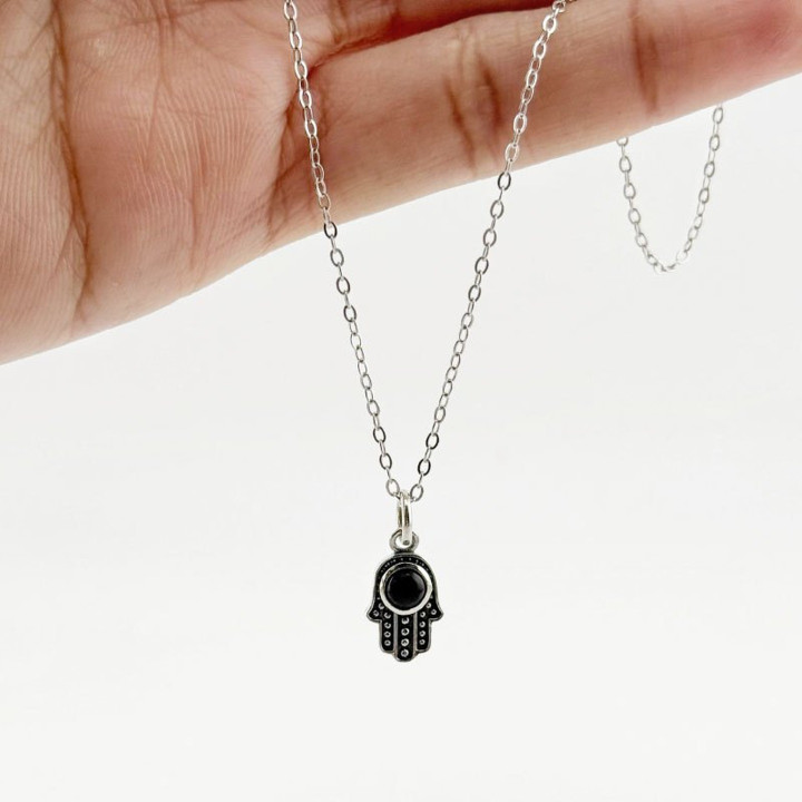 Halskette aus Sterlingsilber mit Hamsa- und Nazar-Auge-Motiv für Schutz und Glück