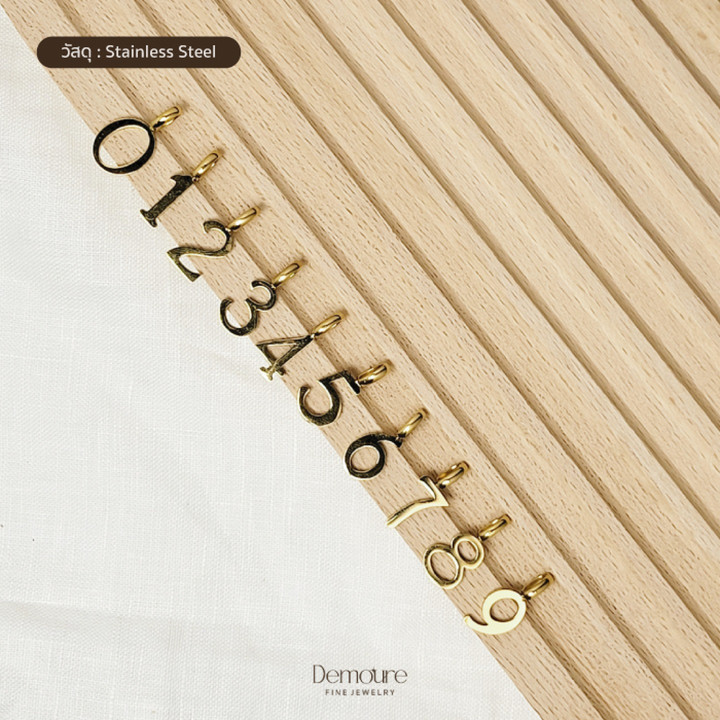 Demoure Collection: Energizing Number Charm Jewelry