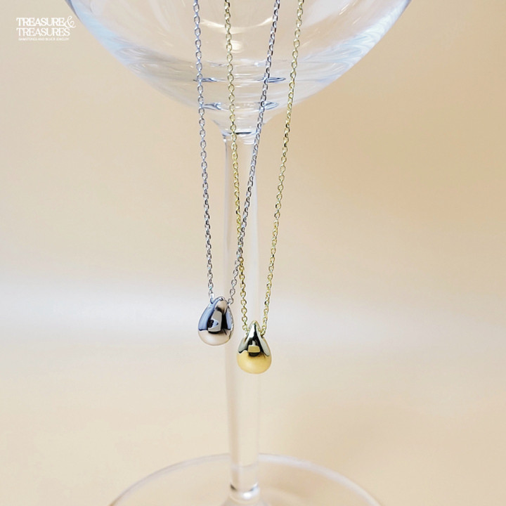 Sterling Silver Pear Pendant: Symbol of Abundance and Treasure