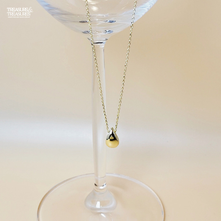 Sterling Silver Pear Pendant: Symbol of Abundance and Treasure